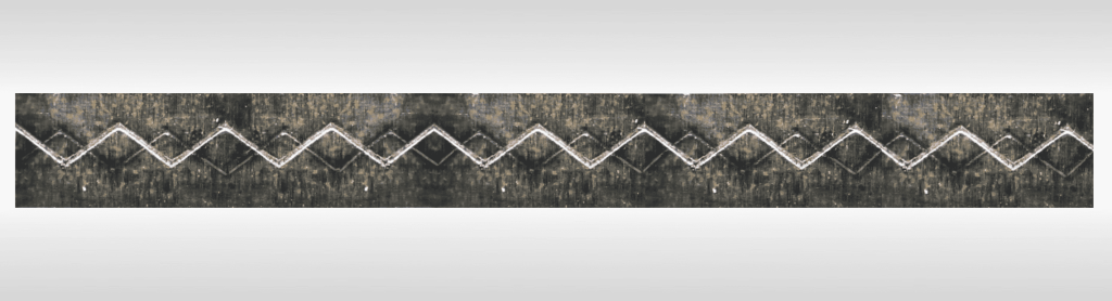 Double zig zag knife impressions on anvil from a flow wrapper