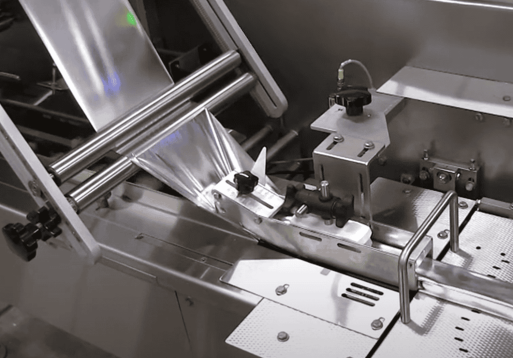 forming box and roller adjustment on a flow wrapper